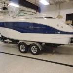 shiny boat on trailer after being detailed